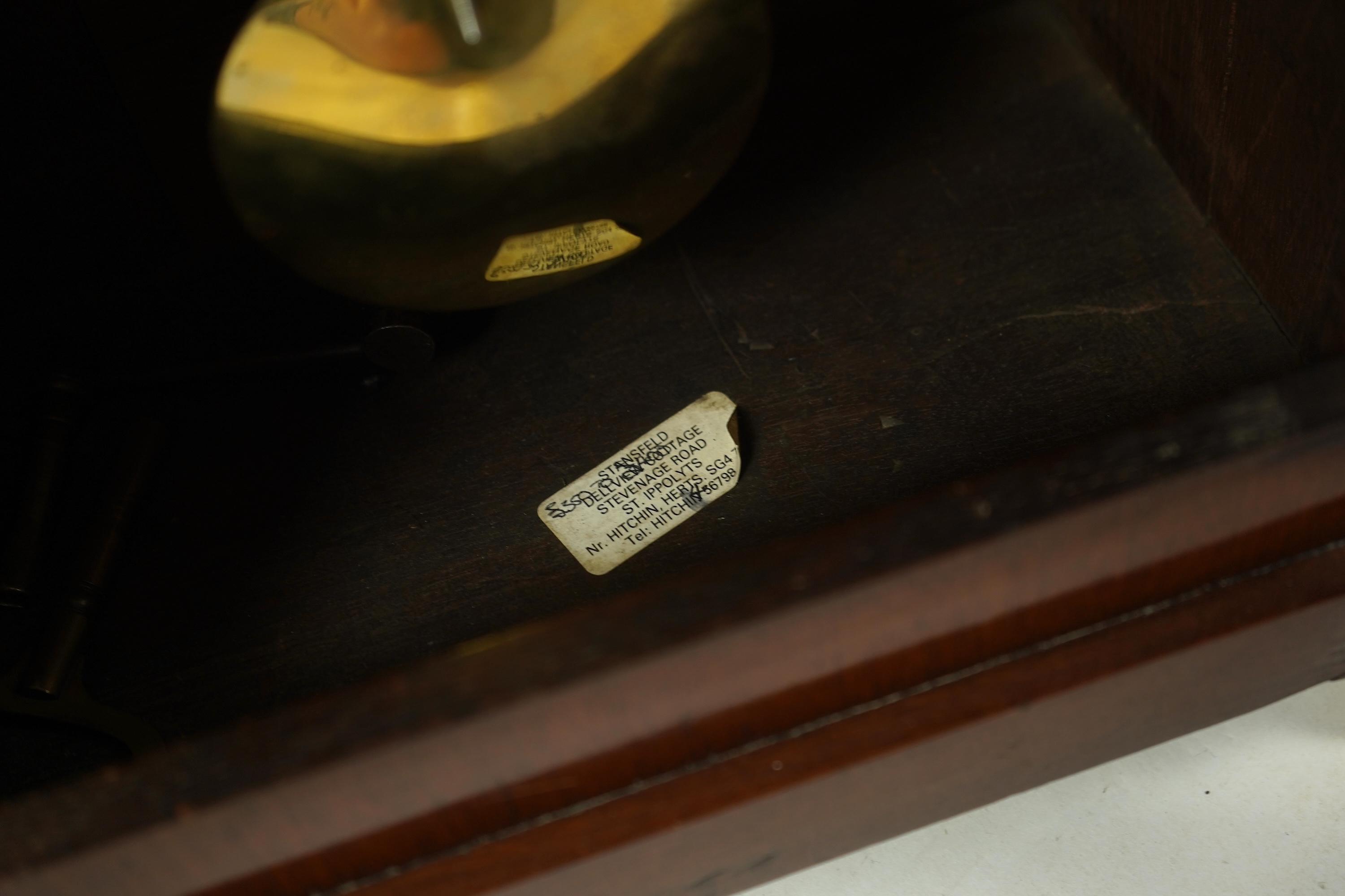 A Regency mahogany and cut brass inlaid bracket clock